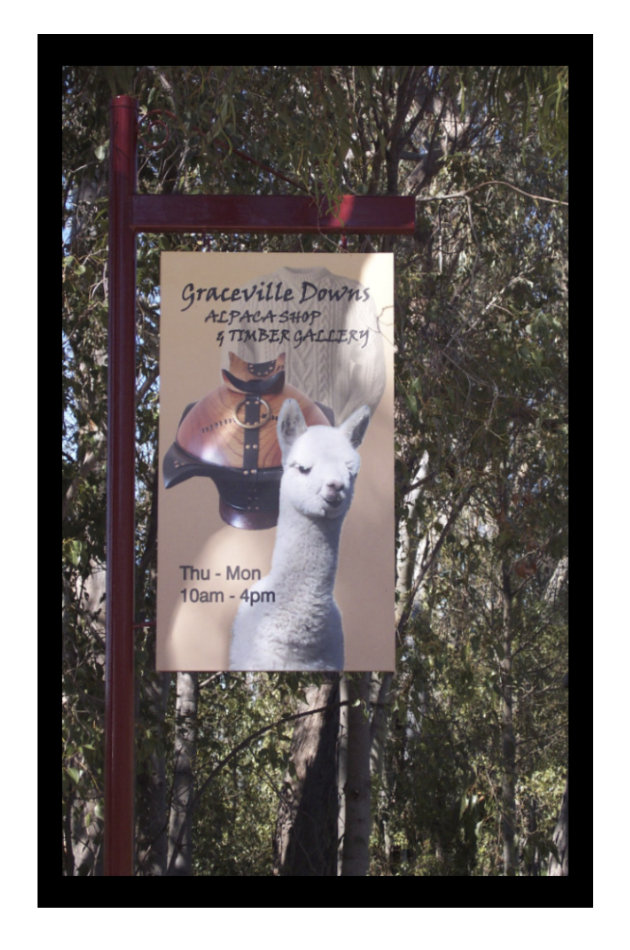 Road sign for a farm shop along a tourist drive